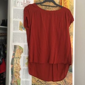 Eco friendly high low burnt orange flowy top